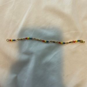 Rainbow and gold bracelet from a cruise